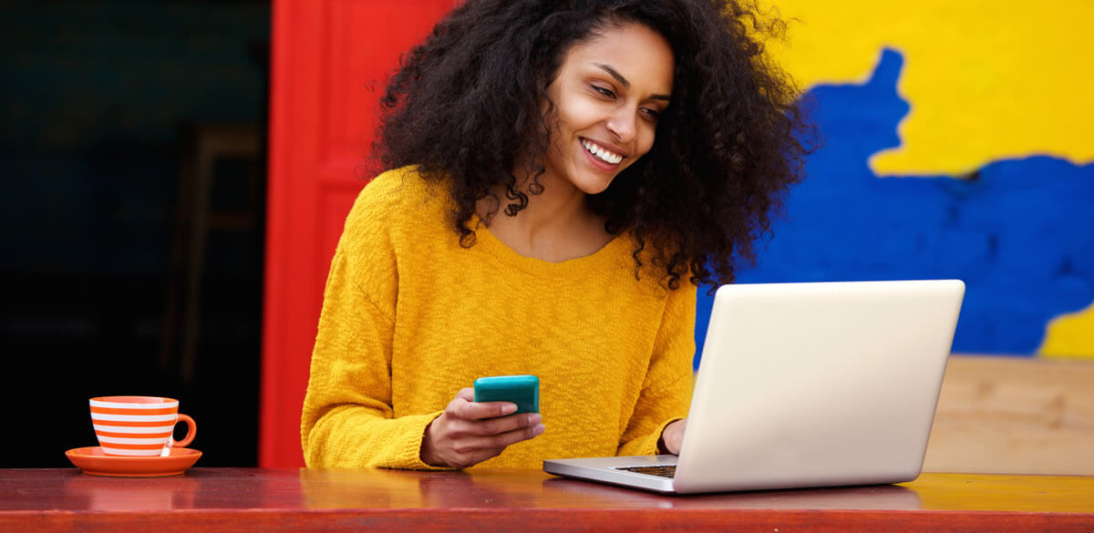 Women making a purchase on a laptop