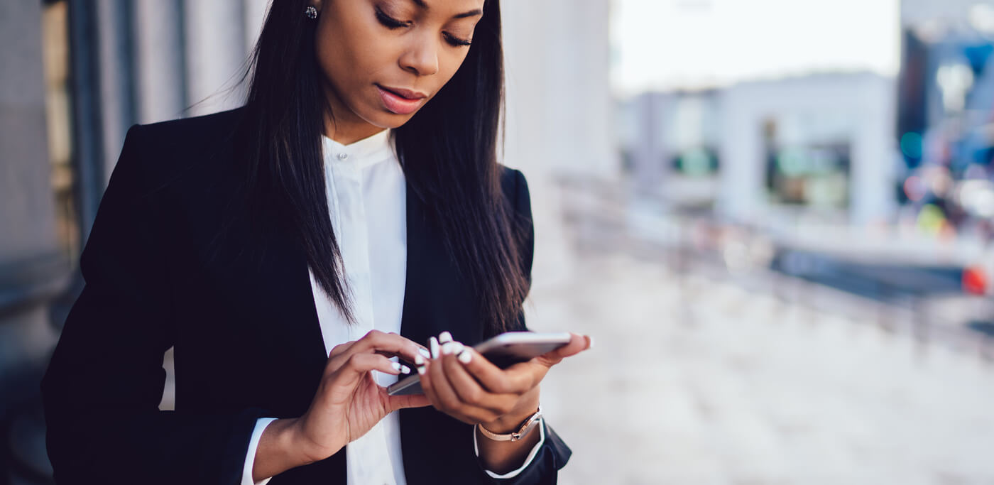 Women looking lost on mobile phone