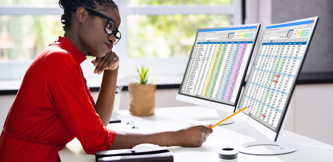 Marketer working on spreadsheets