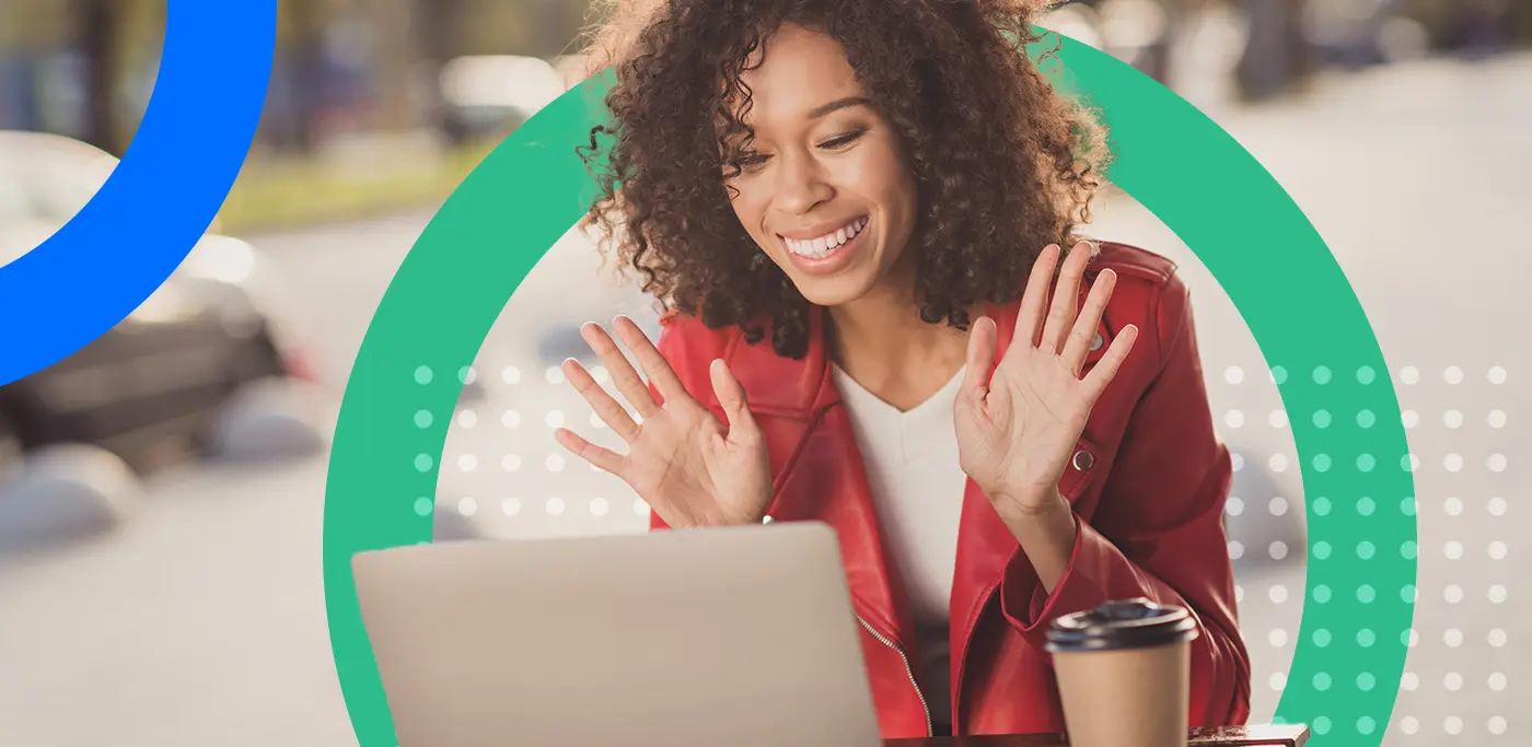 Women with hands up smiling as she receives an interactive email