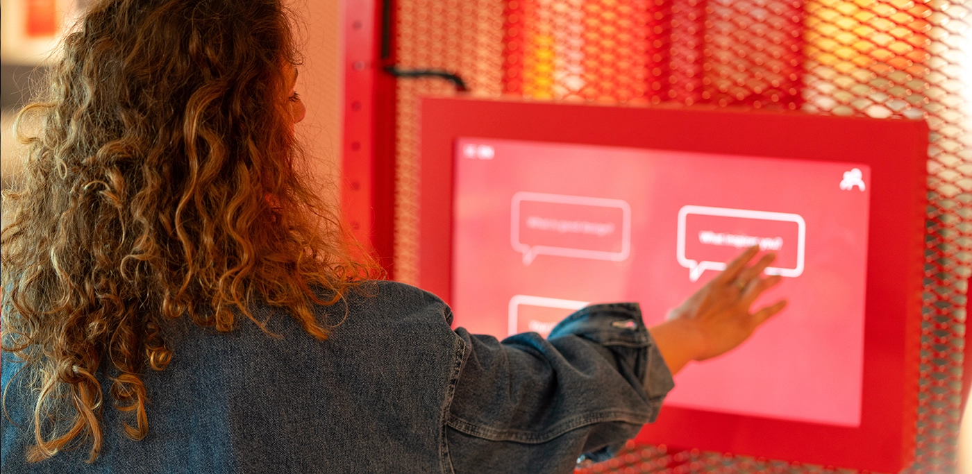 Women taking an electronic survey in store