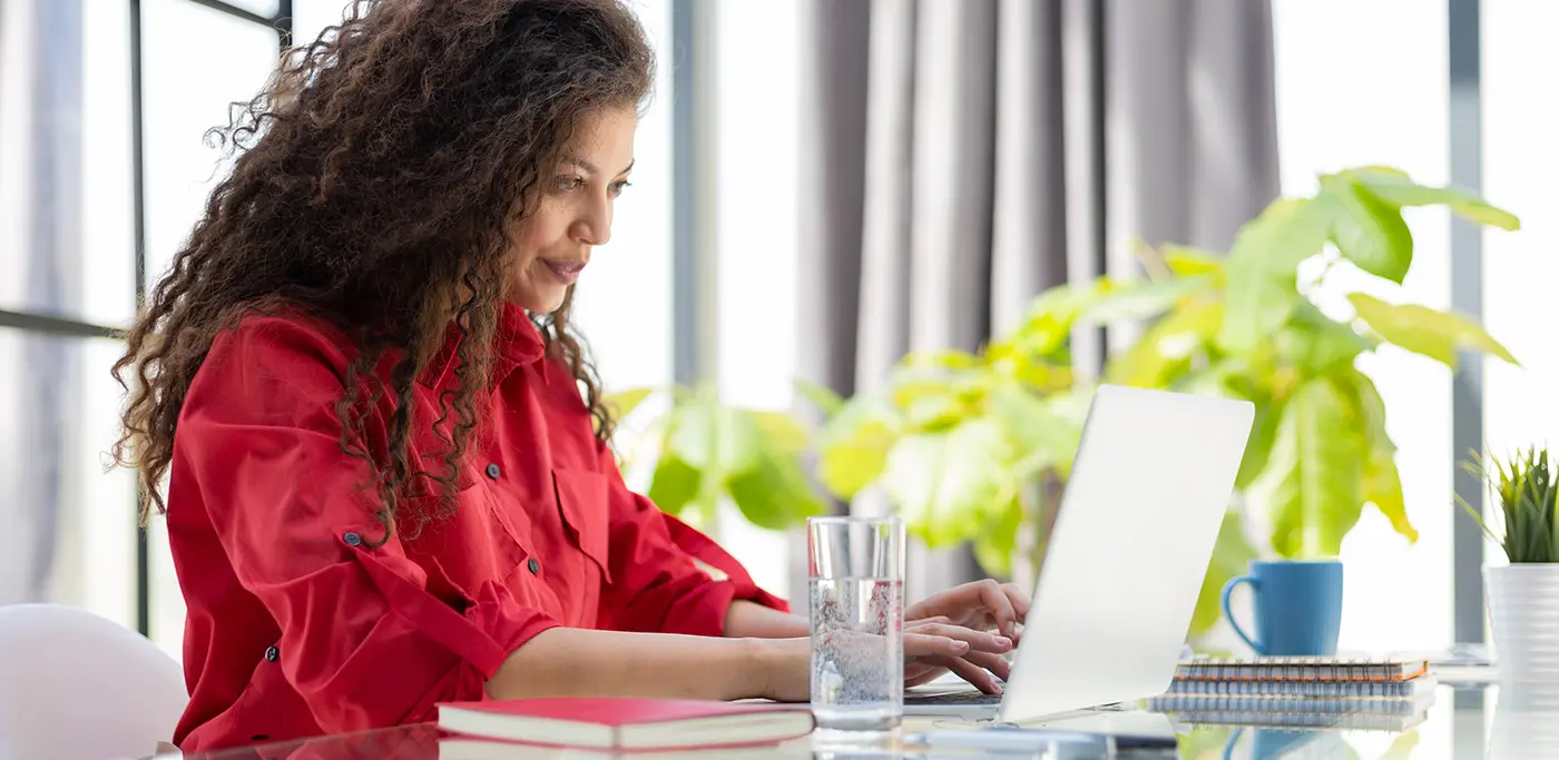 Women at work browsing the internet